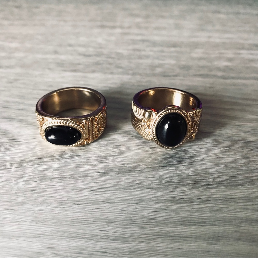 Gold filigree style rings with black stone